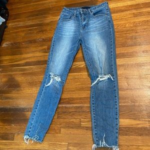 Risen Womens skinny jeans with distressed ankle and knee rips